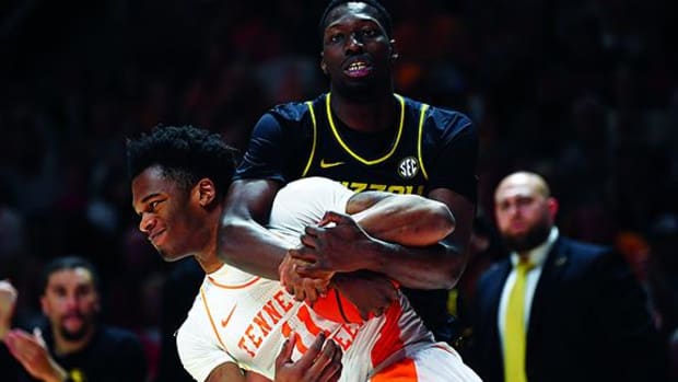 Tennessee forward Tobe Awaka fights for the ball against Missouri.
